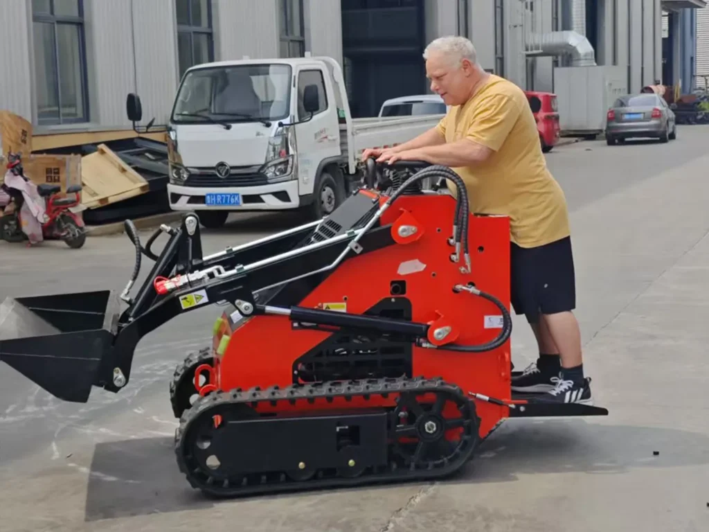 SL-S1 loader being operated outdoors by technician