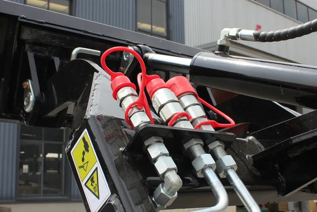SL-S1 quick-connect ports on hydraulic control panel