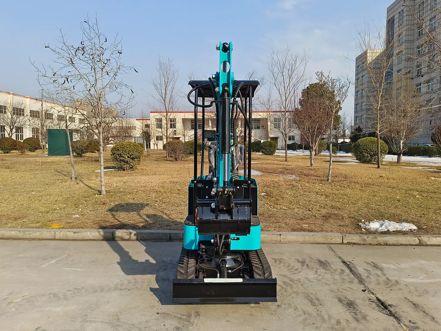 12 mini excavator front view in outdoor real scene