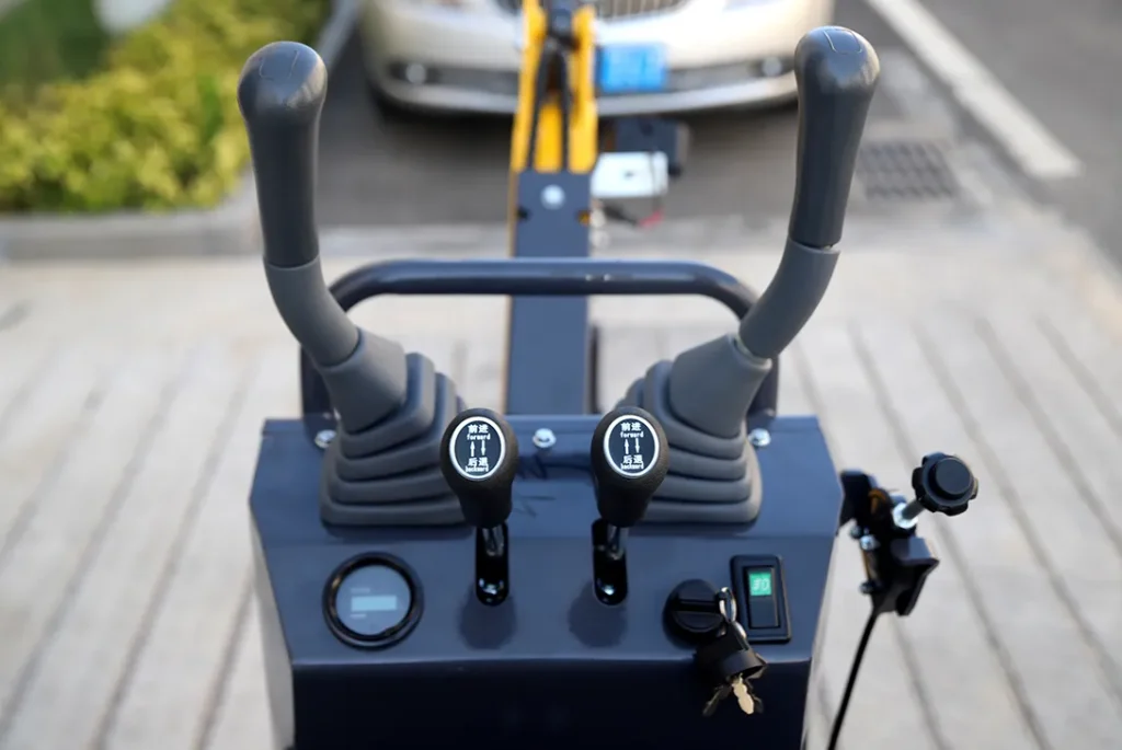 06 mini excavator control levers close-up