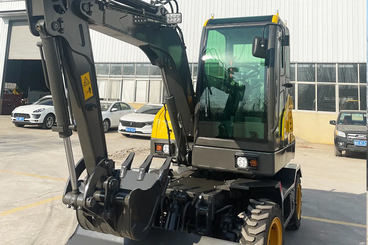 HT45 compact wheel excavator front three-quarter view at factory yard