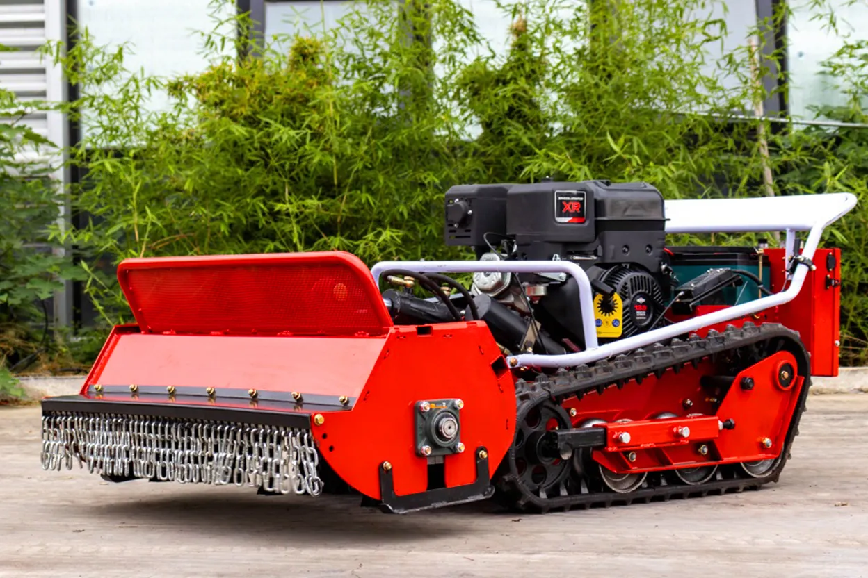 Front side view of 80S remote mower with exposed engine and tracks