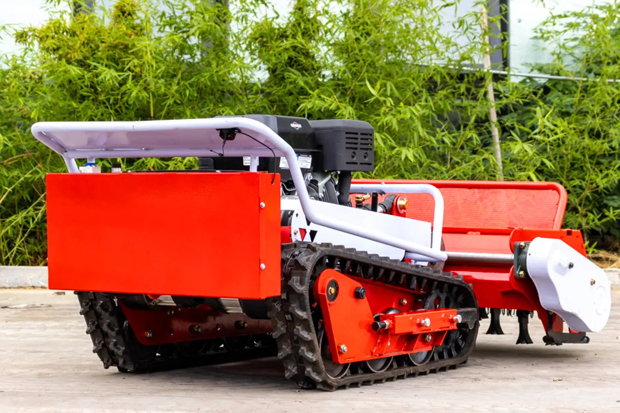 Rear side view of 80S remote mower with red body and rubber tracks