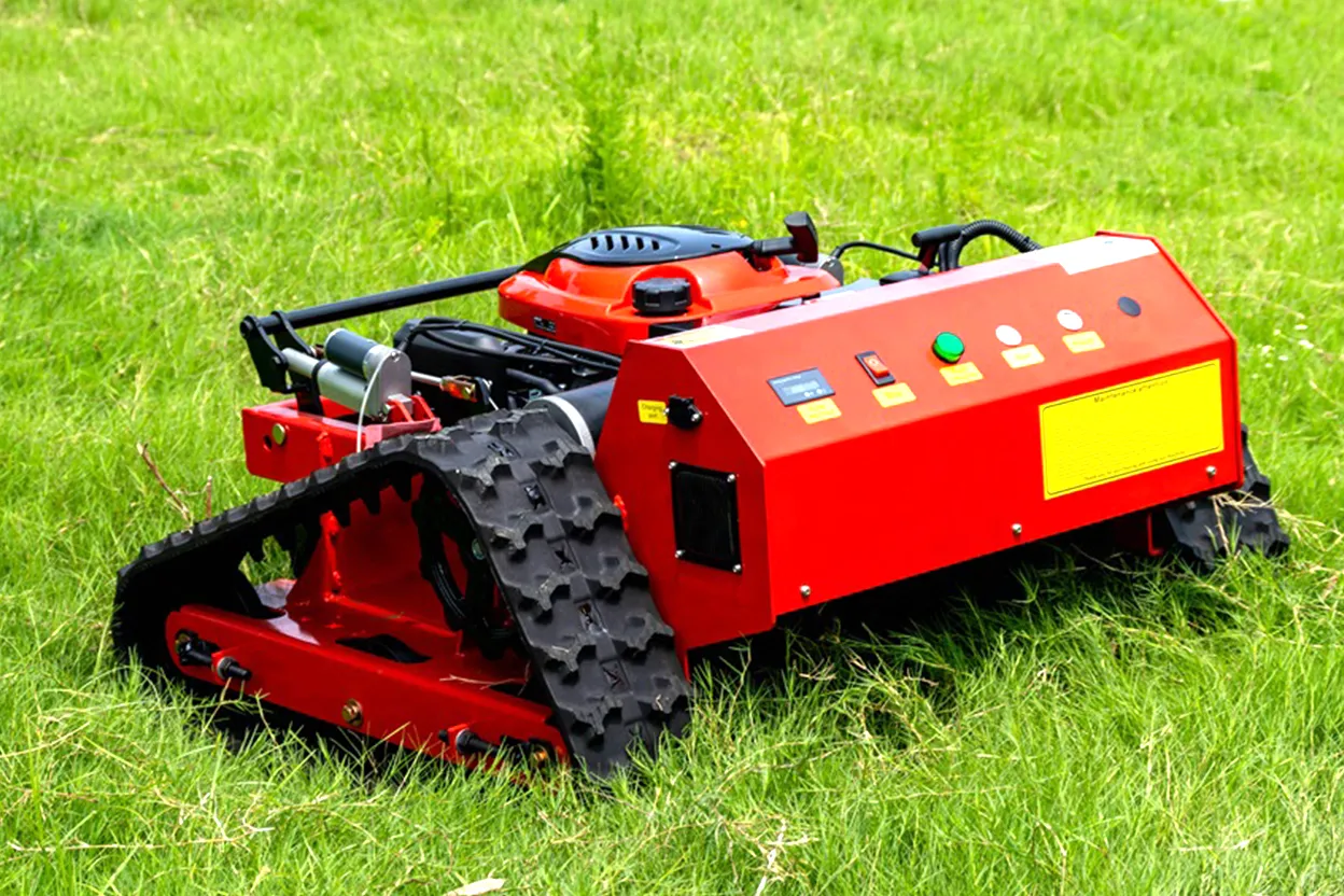 TCL-550B mower climbing grass slope showing tracks and low profile body